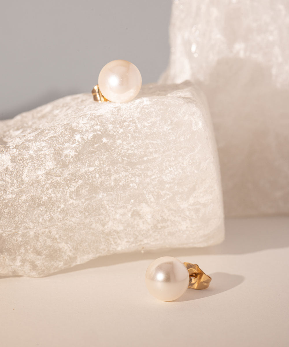 Aretes Perla Rosé | acero inoxidable | baño de oro rosa 18k | Mellany Joyas